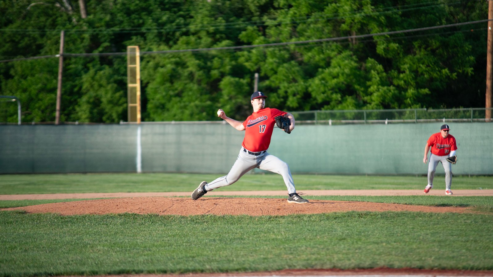 Senior Pioneers pitcher Landon Harney throwing a fastball at Gant Municipal Stadium in Zanesville.