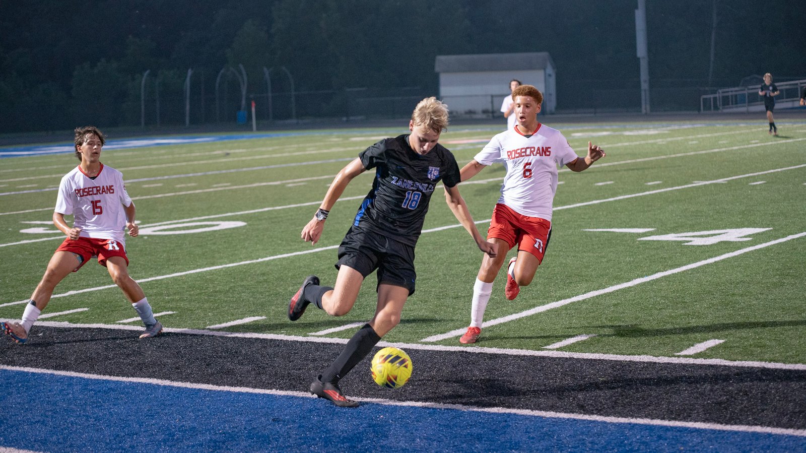 Will Coffey saves the ball from going out of bounds for the Blue Devils.