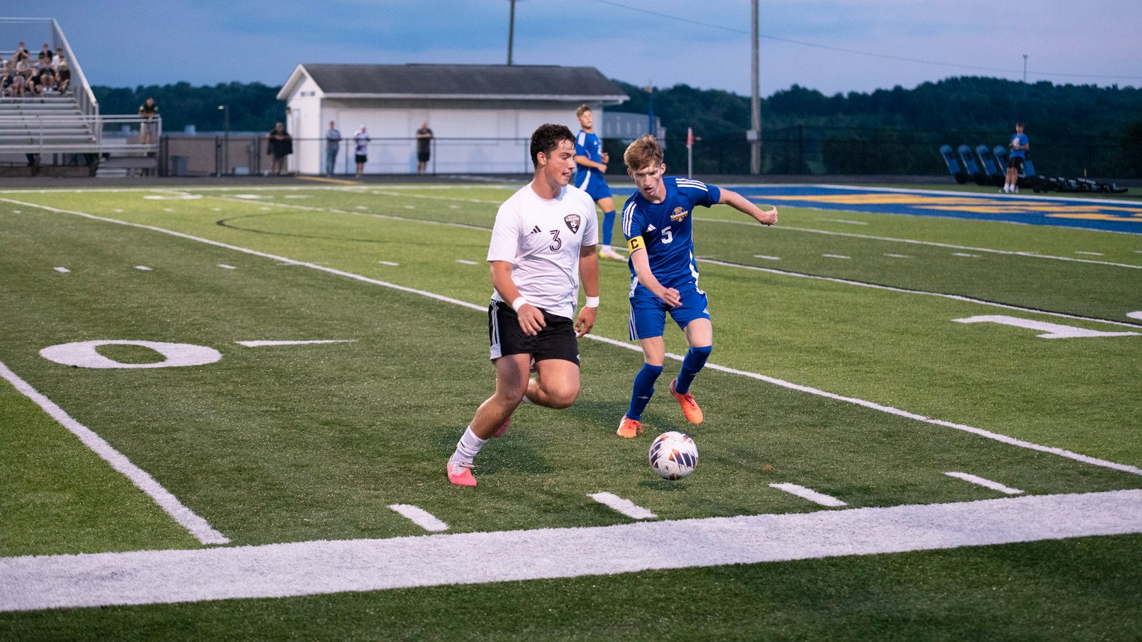 River View's Jax Lowe tries to power past West Muskingum's Brooks McCune on the way to the goal.