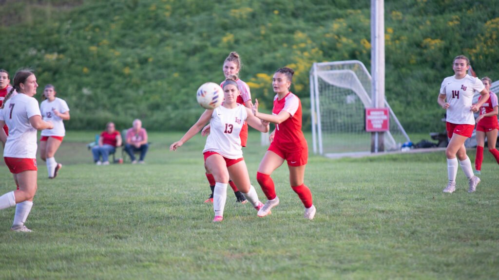 Bishop Rosecrans' Kenna McVicker tries to get the ball away from Liberty Union.